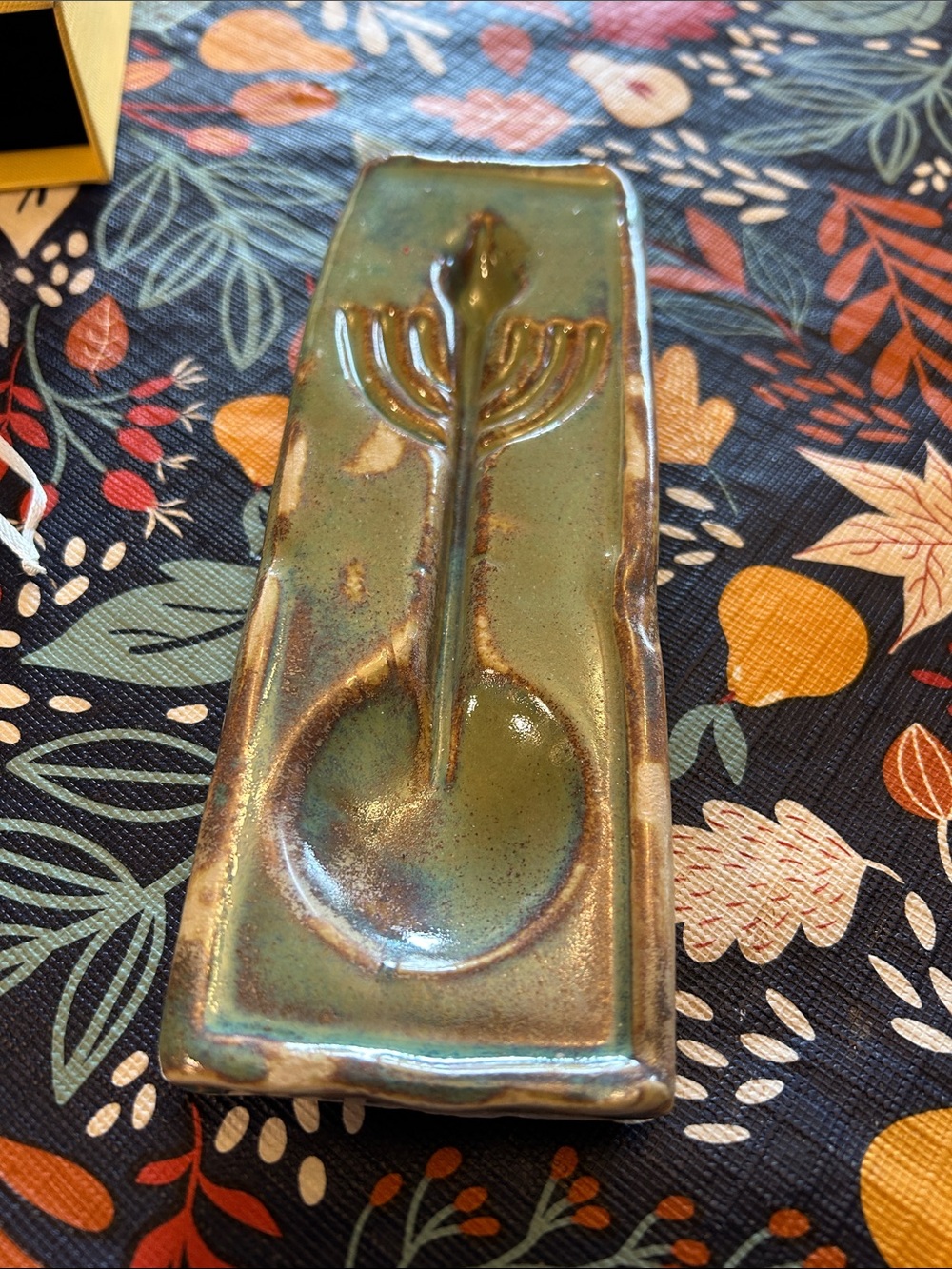 Handmade olive oil menorah with wicks. Green Glaze